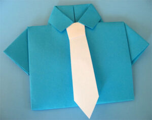 A handmade collared blue shirt card with a white tie, on a blue background.